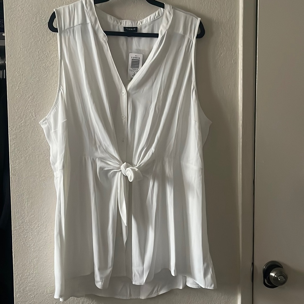 White blouse. Peplum style fit